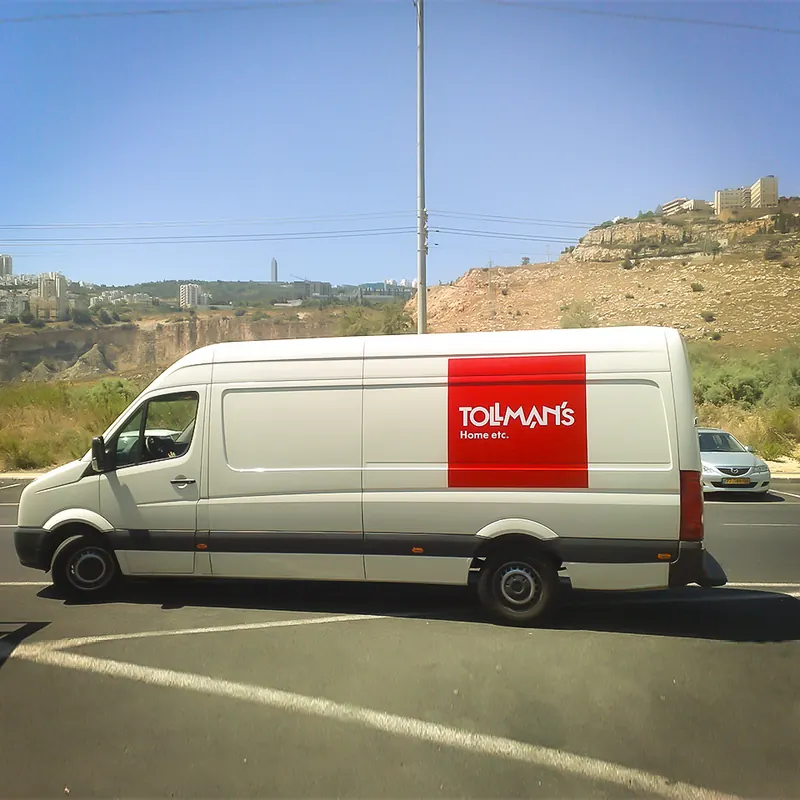 שילוט חזית ופנים בחנות Tollmans — עבודה של אדם שלטים — תמונה 5
